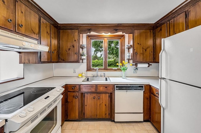 169 Mountainview Rd, East Longmeadow, MA 01028 - kitchen featuring white appliances, a sink, under cabinet range hood, and light countertops