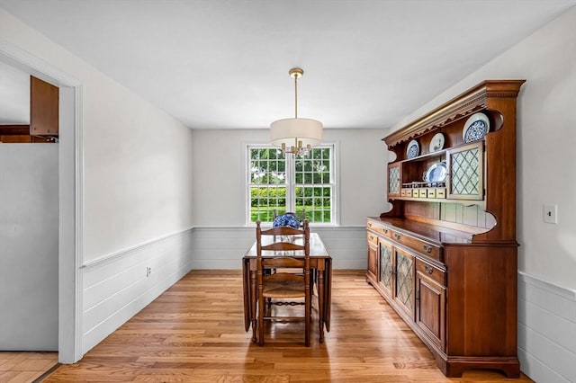 169 Mountainview Rd, East Longmeadow, MA 01028 - dining space featuring wainscoting and light wood finished floors