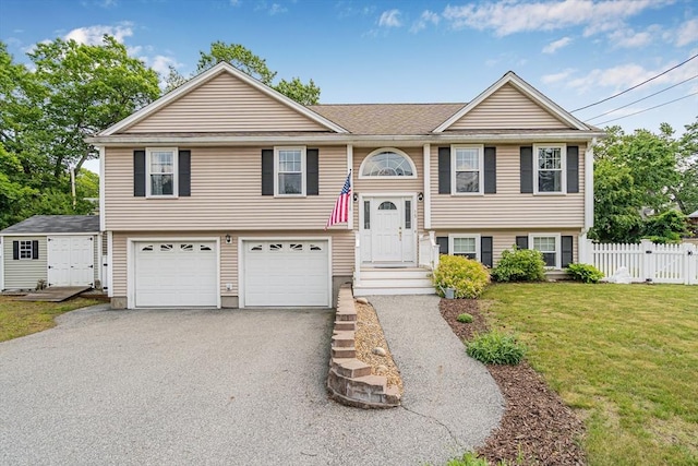 15 King St, Wilmington, MA 01887 - raised ranch with driveway and an attached garage