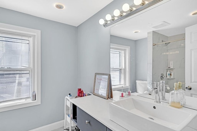 bathroom with vanity and an enclosed shower