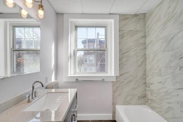 bathroom featuring vanity and a paneled ceiling