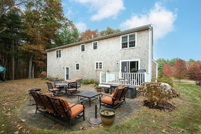 back of house featuring a patio area