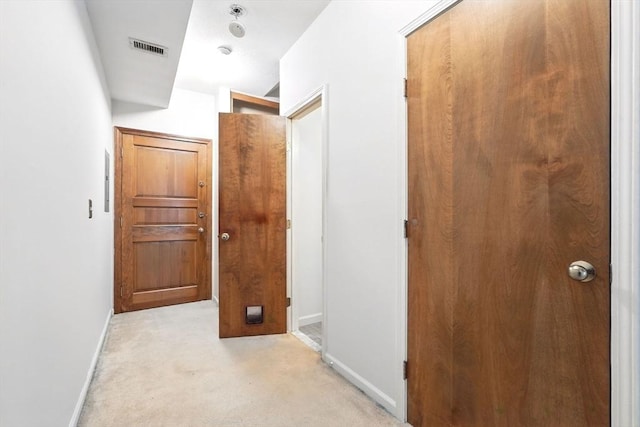 124 College St Unit 20, South Hadley, MA 01075 - corridor featuring baseboards and light colored carpet