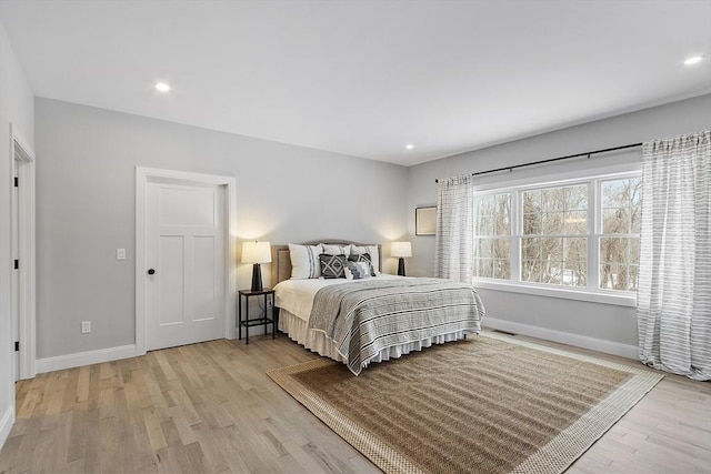 bedroom featuring light hardwood / wood-style flooring