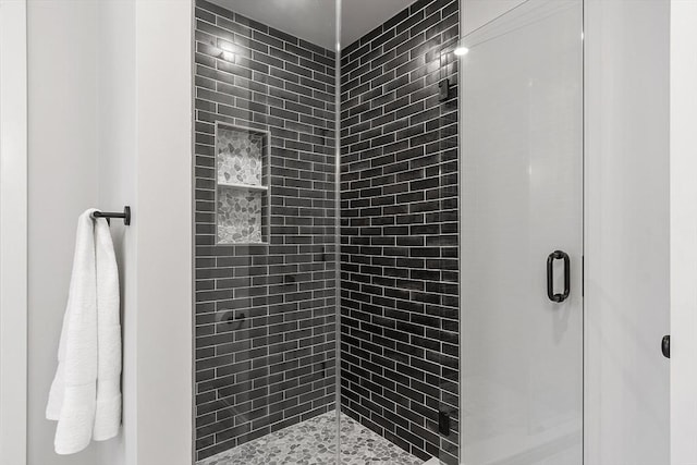 bathroom with an enclosed shower