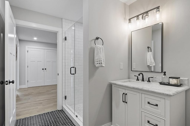 bathroom featuring vanity and walk in shower