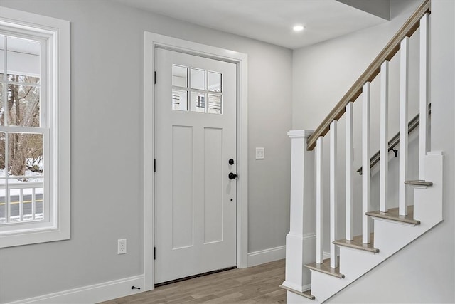 foyer with light hardwood / wood-style floors