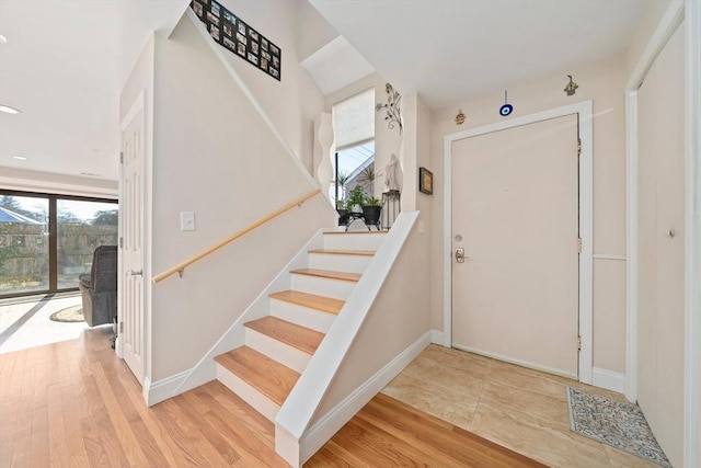 entryway with light hardwood / wood-style floors