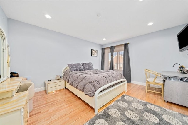 bedroom featuring light hardwood / wood-style flooring