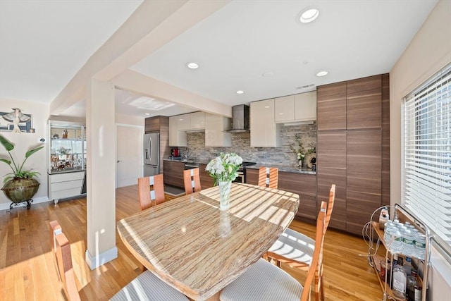 dining room with light hardwood / wood-style floors