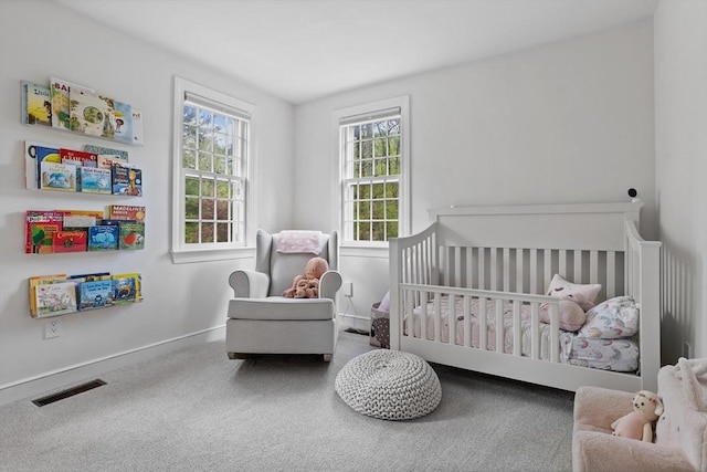 6 Shannon Cir, Westford, MA 01886 - bedroom with baseboards, carpet flooring, and a crib