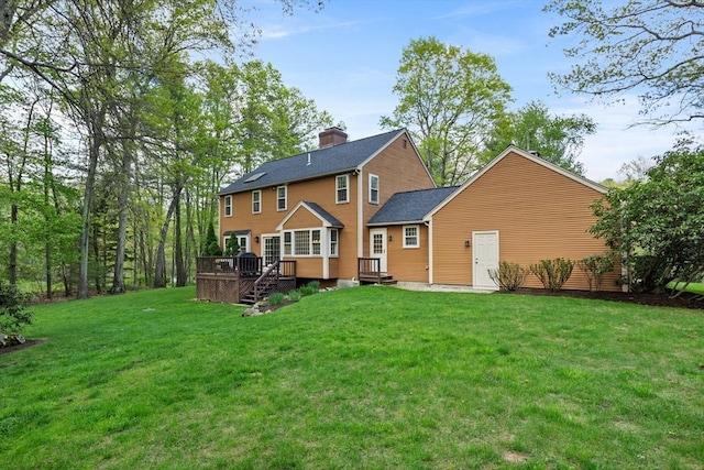 6 Shannon Cir, Westford, MA 01886 - rear view of property with a wooden deck, a yard, and a chimney