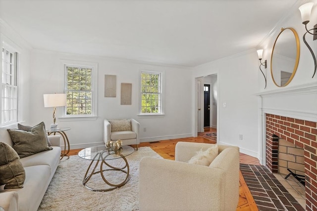 6 Shannon Cir, Westford, MA 01886 - living room featuring a brick fireplace, crown molding, baseboards, and wood finished floors