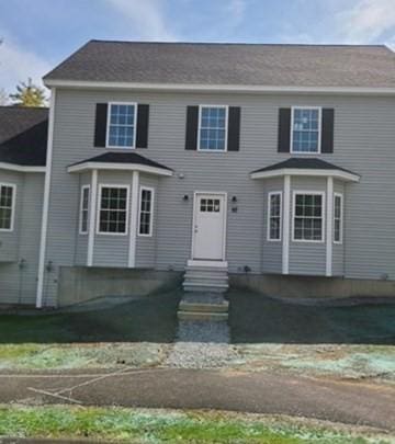 colonial home with entry steps