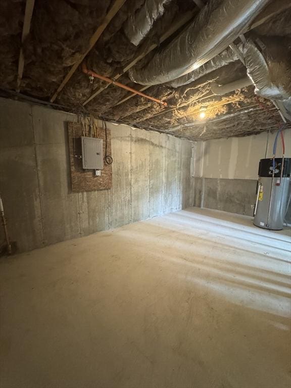 unfinished below grade area with water heater and electric panel