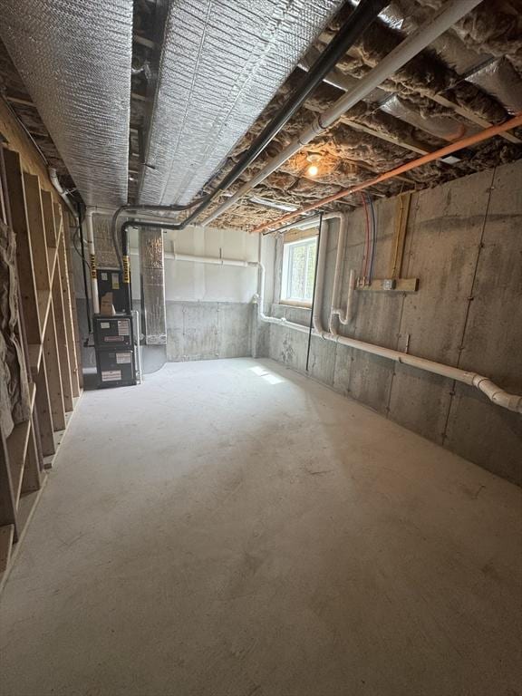 basement featuring heating unit