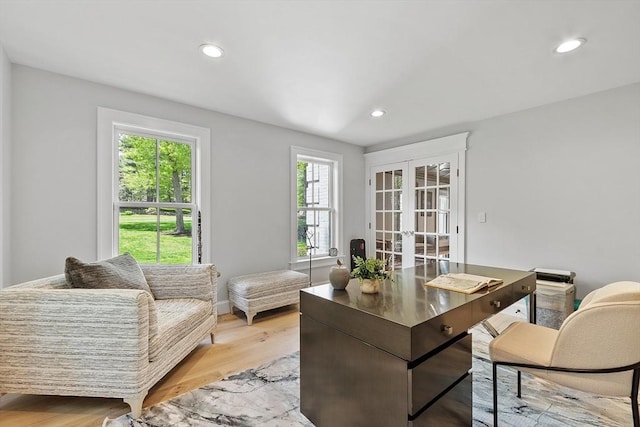 31 Alford Cir, Concord, MA 01742 - home office with french doors, recessed lighting, light wood-style floors, and baseboards