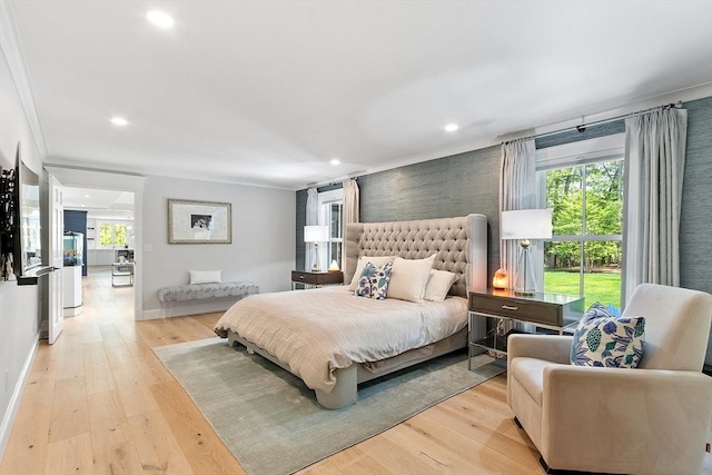 31 Alford Cir, Concord, MA 01742 - bedroom featuring multiple windows, light wood-style floors, recessed lighting, ornamental molding, and baseboards