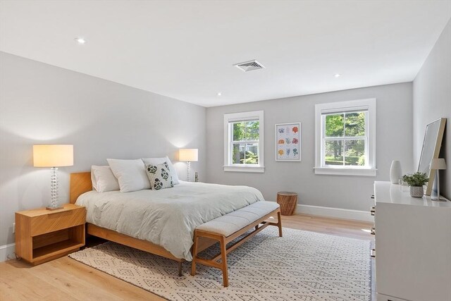 31 Alford Cir, Concord, MA 01742 - bedroom with light wood finished floors, baseboards, and recessed lighting