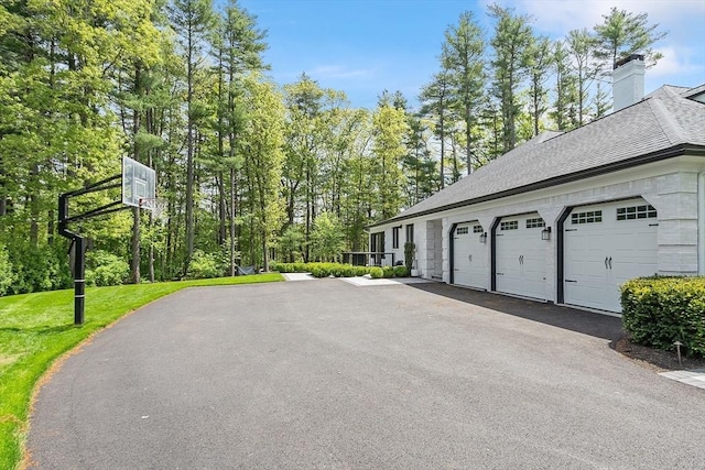 31 Alford Cir, Concord, MA 01742 - garage featuring driveway