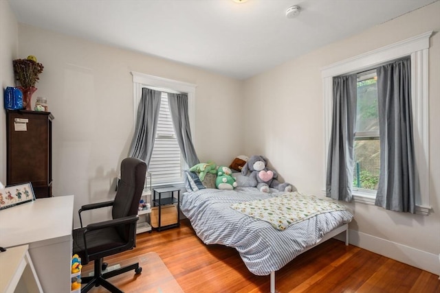 14 Forest Ave, Salem, MA 01970 - bedroom with multiple windows, light wood-style flooring, and baseboards