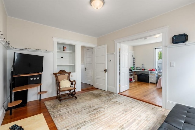 14 Forest Ave, Salem, MA 01970 - sitting room featuring wood finished floors and built in shelves