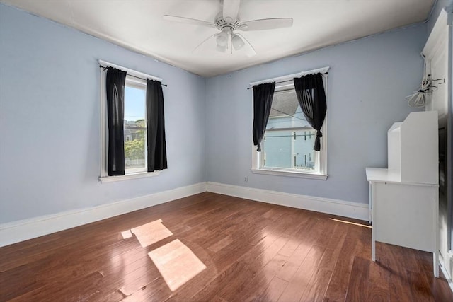 14 Forest Ave, Salem, MA 01970 - unfurnished room with wood finished floors, baseboards, and ceiling fan