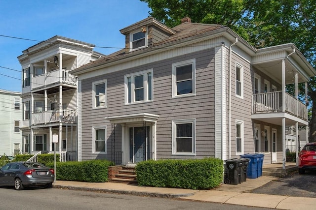 14 Forest Ave, Salem, MA 01970 - view of front of home featuring a balcony and a chimney