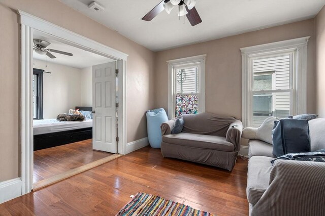 14 Forest Ave, Salem, MA 01970 - living area with a ceiling fan, wood finished floors, and baseboards