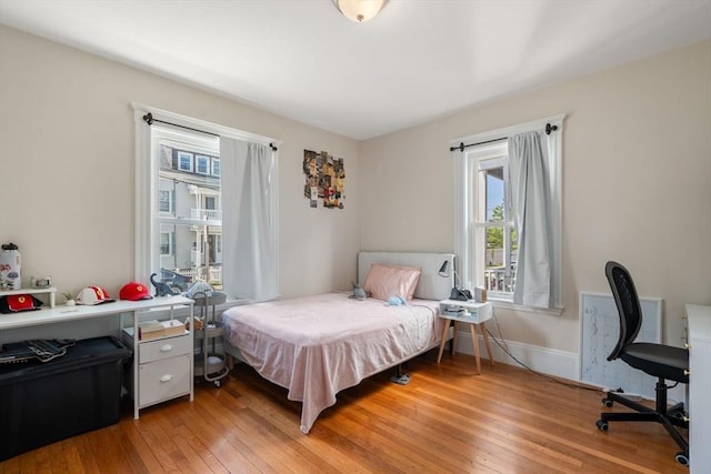 14 Forest Ave, Salem, MA 01970 - bedroom featuring light wood-style flooring, baseboards, and an office area