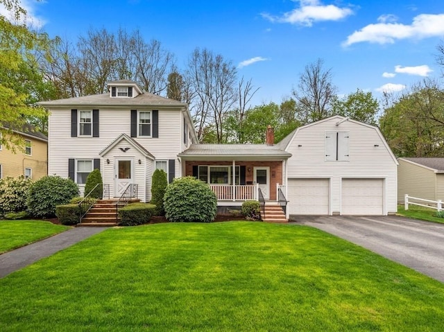 view of front of house featuring covered porch, an attached garage, driveway, a front lawn, and a chimney