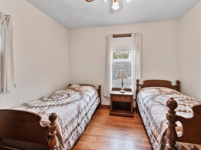 bedroom with wood-type flooring