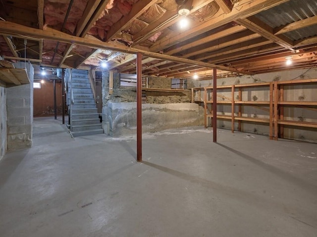 unfinished basement with stairway