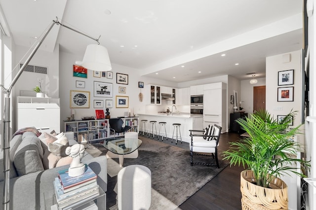 living room with dark hardwood / wood-style floors