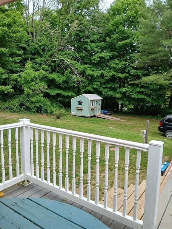 64 Broad St, Rehoboth, MA 02769 - wooden deck featuring a lawn