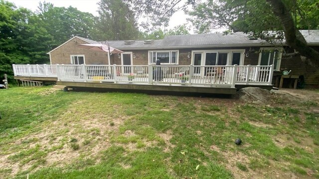 64 Broad St, Rehoboth, MA 02769 - back of property with a yard and a deck