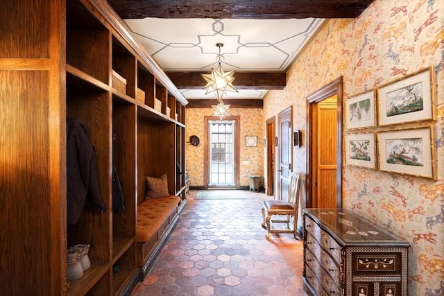 mudroom featuring crown molding