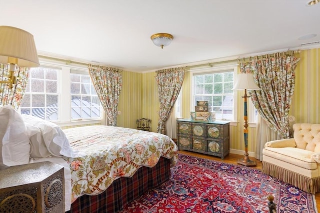 bedroom with hardwood / wood-style flooring