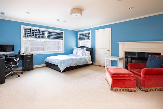 carpeted bedroom with ornamental molding