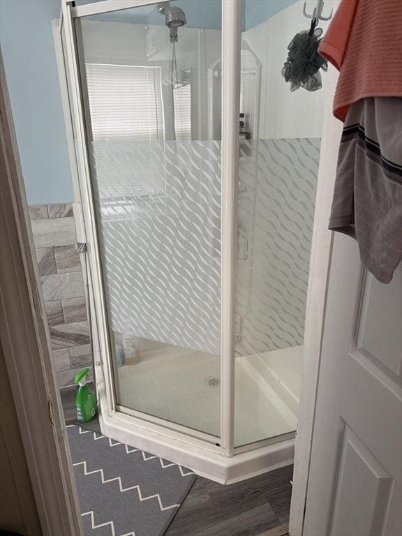 72 Wright St, Stoneham, MA 02180 - full bathroom featuring a shower stall and wood finished floors