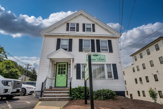 72 Wright St, Stoneham, MA 02180 - view of front of home with entry steps and cooling unit