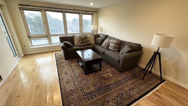 1001 Marina Dr Unit 213, Quincy, MA 02171 - living room with plenty of natural light, light wood finished floors, baseboards, and recessed lighting