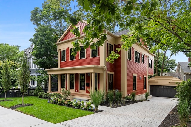 view of front of home with a front yard and a porch