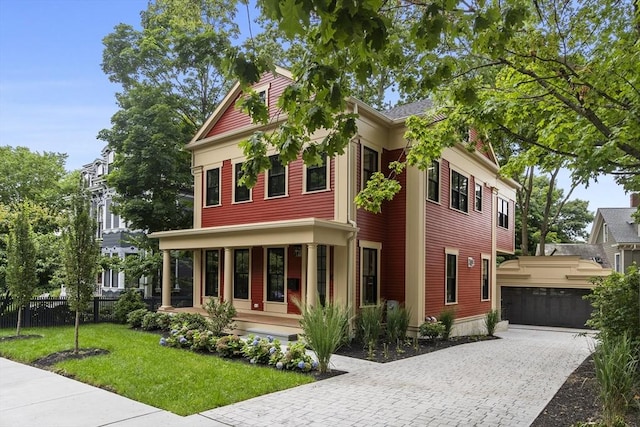 view of front of house featuring a front yard and fence