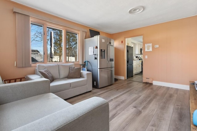 living room featuring light wood-type flooring