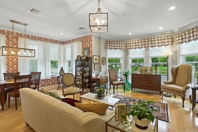 132 High St Unit B, Newburyport, MA 01950 - sitting room featuring a chandelier, crown molding, light wood-style flooring, and recessed lighting
