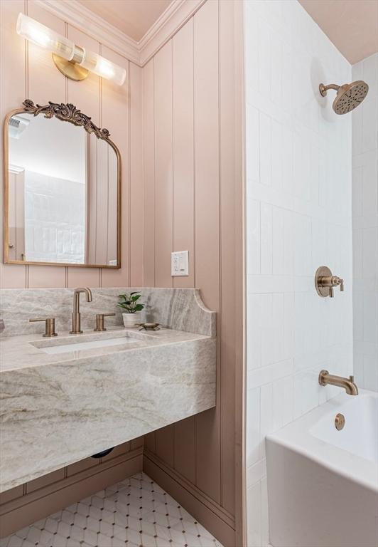 151 Salisbury Rd, Brookline, MA 02445 - bathroom with vanity, ornamental molding, and  shower combination