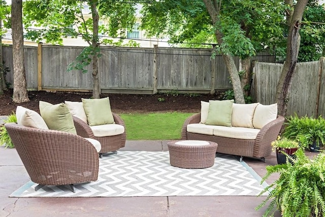 151 Salisbury Rd, Brookline, MA 02445 - fenced backyard with outdoor lounge area and a patio