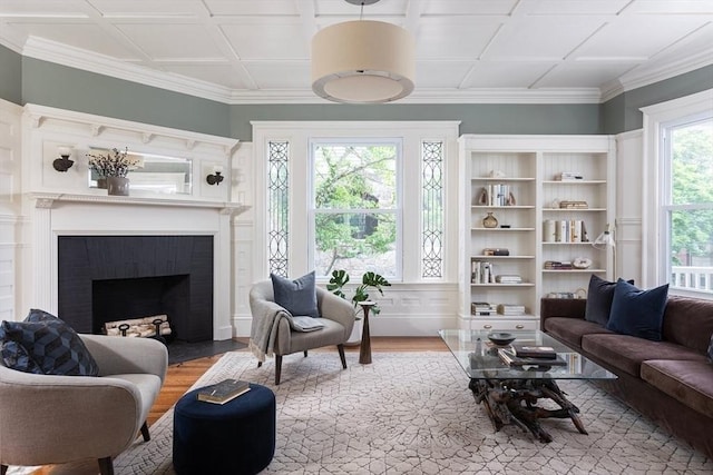 151 Salisbury Rd, Brookline, MA 02445 - living room featuring wood finished floors and a brick fireplace