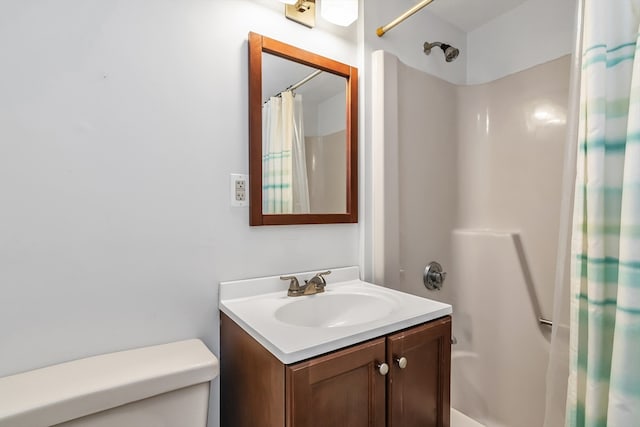 full bath with toilet, shower / tub combo, and vanity